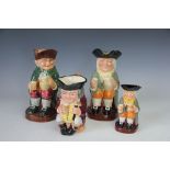 Four Royal Doulton toby jugs; Happy John, 22.5cm high and another 14cm high, Jolly Toby 15.