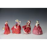 Four Royal Doulton figures, Genevieve HN1962, 19cm high, Autumn Breezes HN1934, 20cm high,