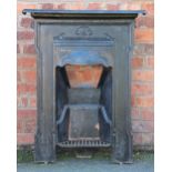 A Victorian cast iron fireplace, with sinuous detail (at fault) 92cm high,