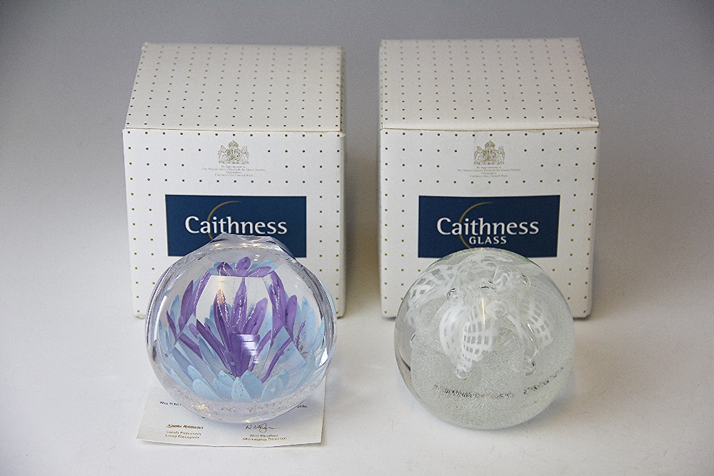 Two Caithness Glass paperweights, to include; Tranquil Days designed by Sarah Peterson,