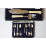 A pair of silver fish servers, John Round, Sheffield 1919, with ivory handles,