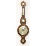 An early 19th century mahogany wheel barometer, with silvered dial, thermometer,