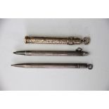 A Sampson Mordan & Co yellow metal retractable pencil, engraved 'S H Andrews,