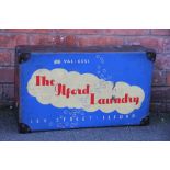 A vintage 'The Ilford Laundry' laundry box and cover,