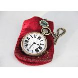 A Goliath open faced pocket watch, the white enamel dial with black Roman numerals,