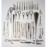 A collection of advertising button and glove hooks, to include; Johnson Johnson & Co's Pure Tea,