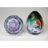 A Caithness Glass paperweight;