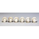 A cased set of six horseshoe menu holders, Sampson Mordan, Chester 1905,