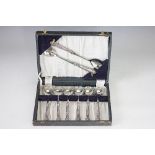 A cased set of Kings pattern silver handled fruit salad servers and spoons,