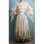 An Edwardian ivory silk full length skirt and similar top,