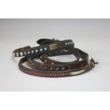 Four assorted leather dog collars, to include; a 19th century turquoise coloured stone set example,