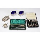 A selection of silver and plated wares, to include; a cased silver handled button,