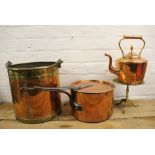 A 19th century large copper saucepan and cover, with riveted wrought iron handles, number 26,