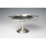 A silver tazza, Martin Hall & Co, Sheffield 1916, of circular pedestal form and with galleried rim,