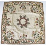 An 18th century embroidered panel,