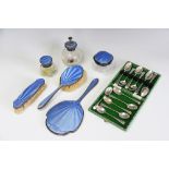 Six silver and blue enamel dressing table items, all Mappin and Webb, 1934-35,