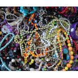 A quantity of costume jewellery, to include; beads, bracelets, bangles,