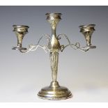 A silver candelabrum, E J Trevitt & Sons, Chester 1912, of baluster form and with two branches,