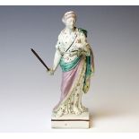 An 18th century Pratt figure of a Classical lady holding a balance and a sword,