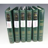 A collection of four volumes of 'coins and stamps of the world' relating to Royalty,