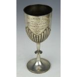 A silver pedestal cup, Charles Stuart Harris, London 1901, engraved 'Clapham Cup, presented by C.