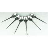 A set of Georg Jensen Danish stainless steel dessert spoons, stamped,