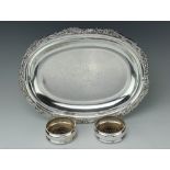 A pair of circular silver collared bottle coasters, Harrison Brothers & Howson Ltd, London 1994,