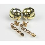 A pair of bi-colour entwined knot stud earrings, stamped 'Italy',