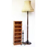 An Ercol plate rack, a standard lamp with shade,