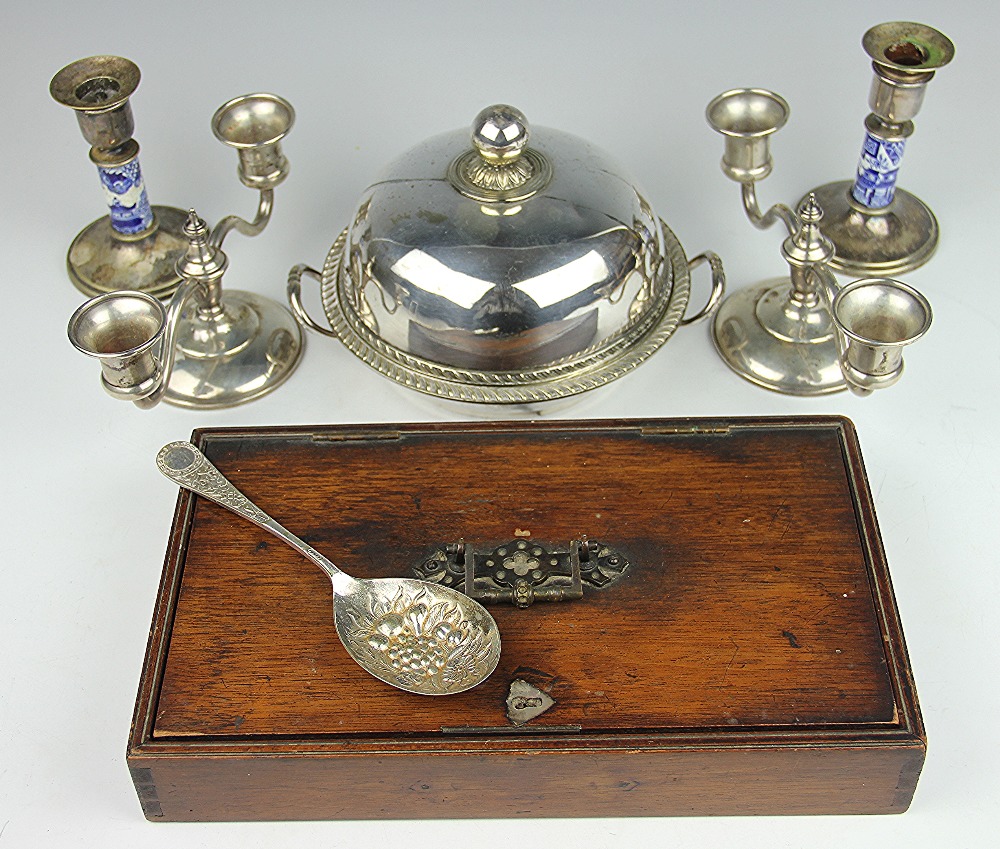 Two American white metal candelabra, stamped 'sterling', 9cm high, a muffin dish and cover,