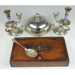 Two American white metal candelabra, stamped 'sterling', 9cm high, a muffin dish and cover,