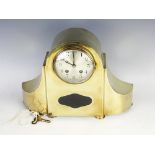 A brass cased 8 day mantle clock, 19th century, the silvered dial with black Arabic numerals,