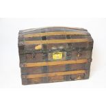 A late 19th century dome top bentwood and metal bound trunk,