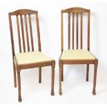 A set of four 1930's oak dining chairs,