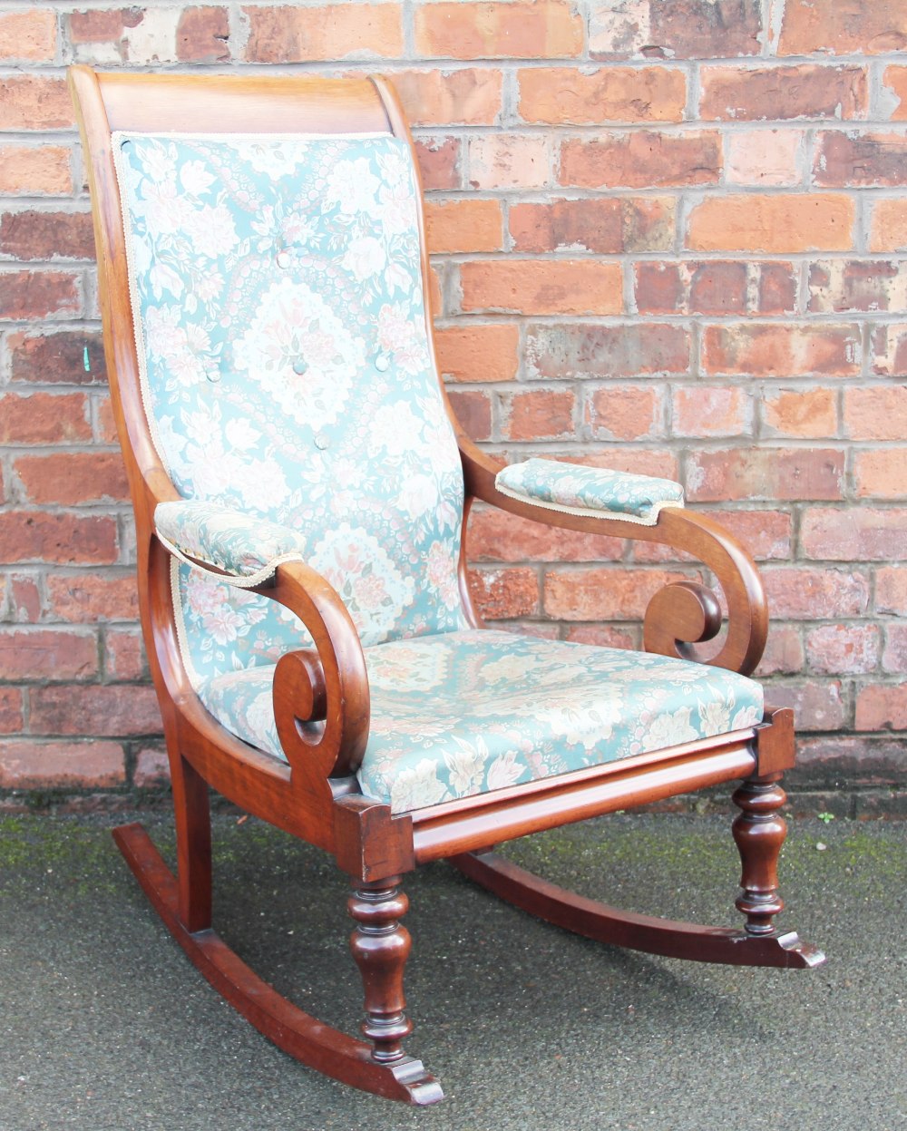 A Victorian mahogany framed rocking chair,