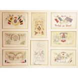 A collection of twenty one WWI silk embroidered postcards,