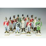 A collection of twelve Capodimonte style porcelain soldiers,