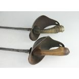 Two 1912 pattern cavalry swords, one with blade initialled EFD,
