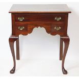 A late Victorian mahogany low boy, the rectangular top above a central drawer,