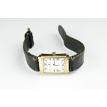 A gent's 9ct yellow gold wristwatch, Birmingham 1939, of rectangular form,