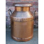 A copper milk churn and cover, the lid named for 'Dried Milk Products Ltd',