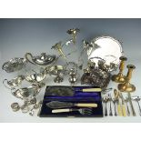 An assortment of silver plated wares, to include a three piece tea set,