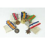 A selection of medals, to include a WWI trio, named to '81622 DVR J W Burkitt RA',
