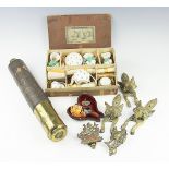 A 19th century lacquered brass two drawer telescope, with three brass fox heads door knockers,