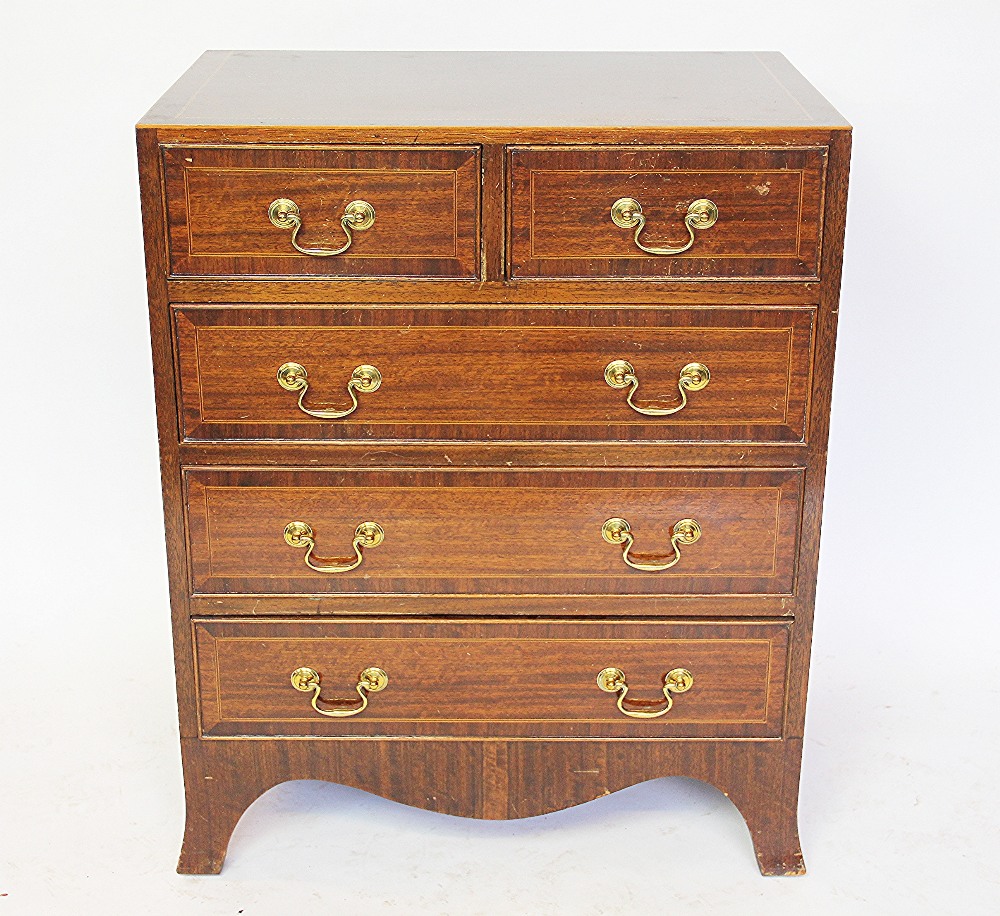 A Edwardian mahogany and satinwood inlaid chest of two short above three long drawers,