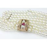 A four strand cultured pearl bracelet,