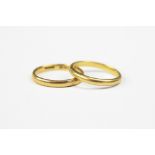 Two 22ct yellow gold bands, total weight 8.