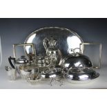 A selection of silver plated wares to include; a wine ewer with half wrythen decoration,