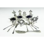 A selection of silver to include; a five piece condiment set, Walker & Hall, Birmingham 1924,