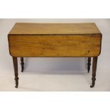 A 19th century mahogany Pembroke table, with drawer, on turned legs,